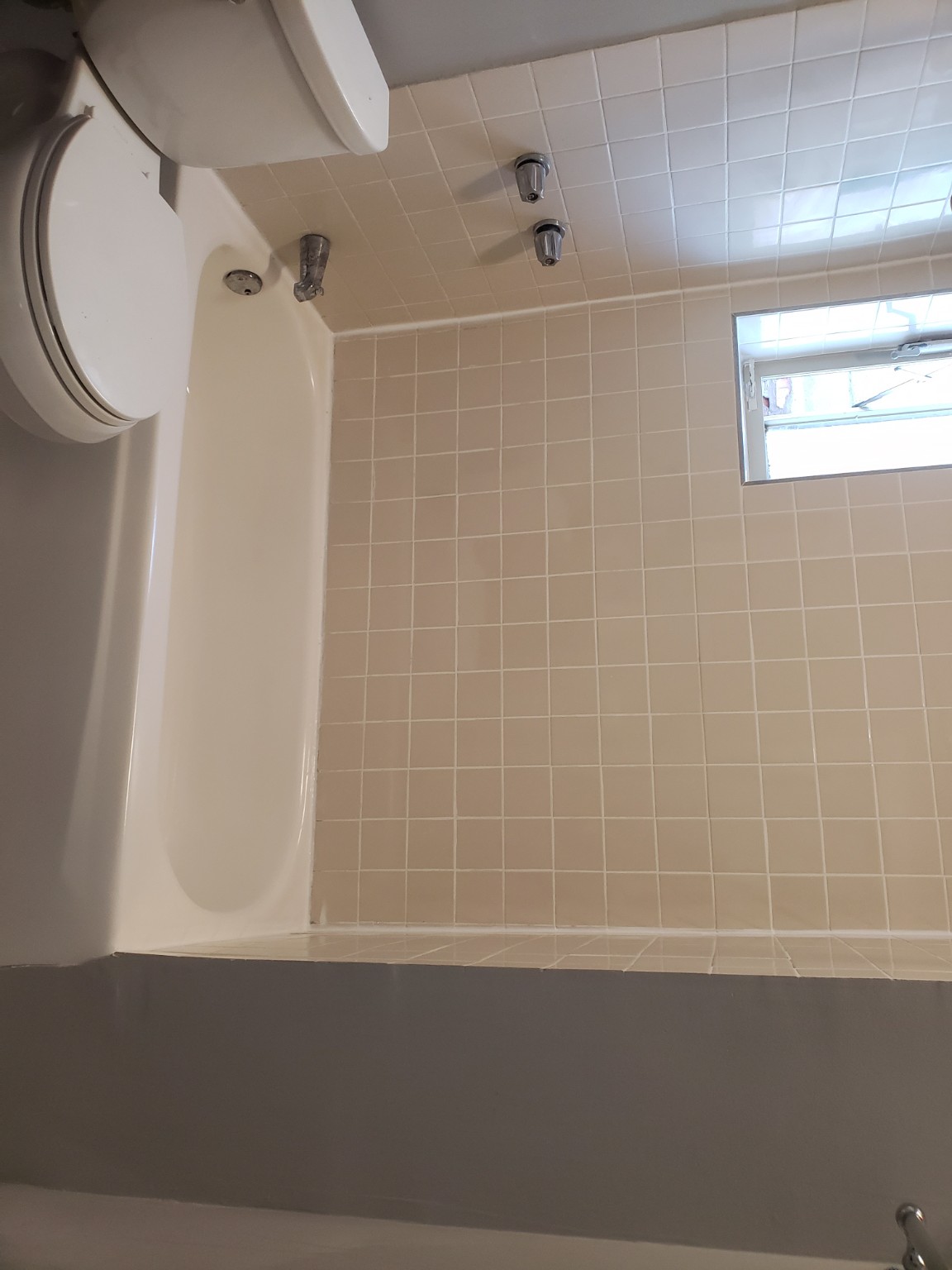 Clean finished bathtub and tile surround