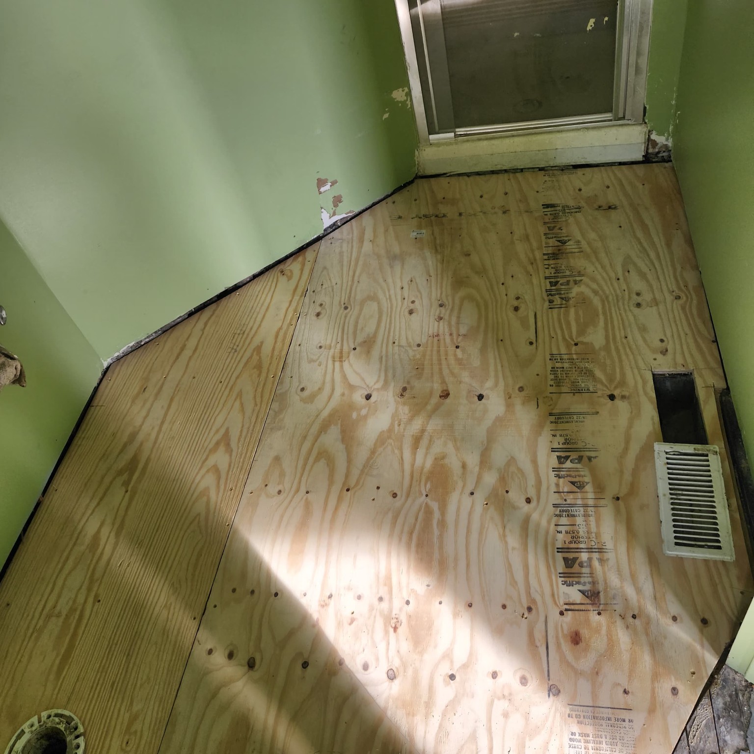 Completed plywood subfloor repair